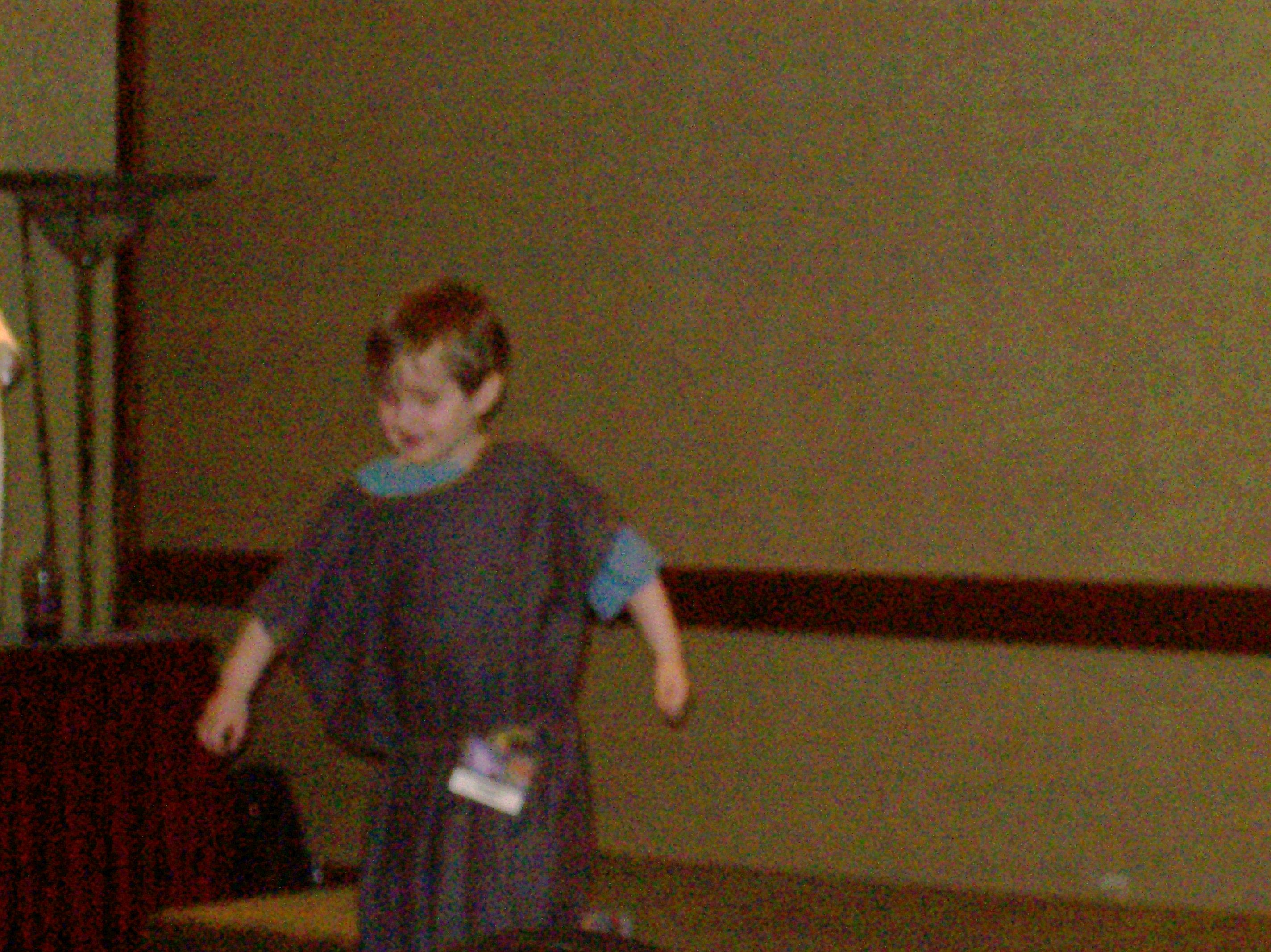 Little Boy Walking Down The Stage