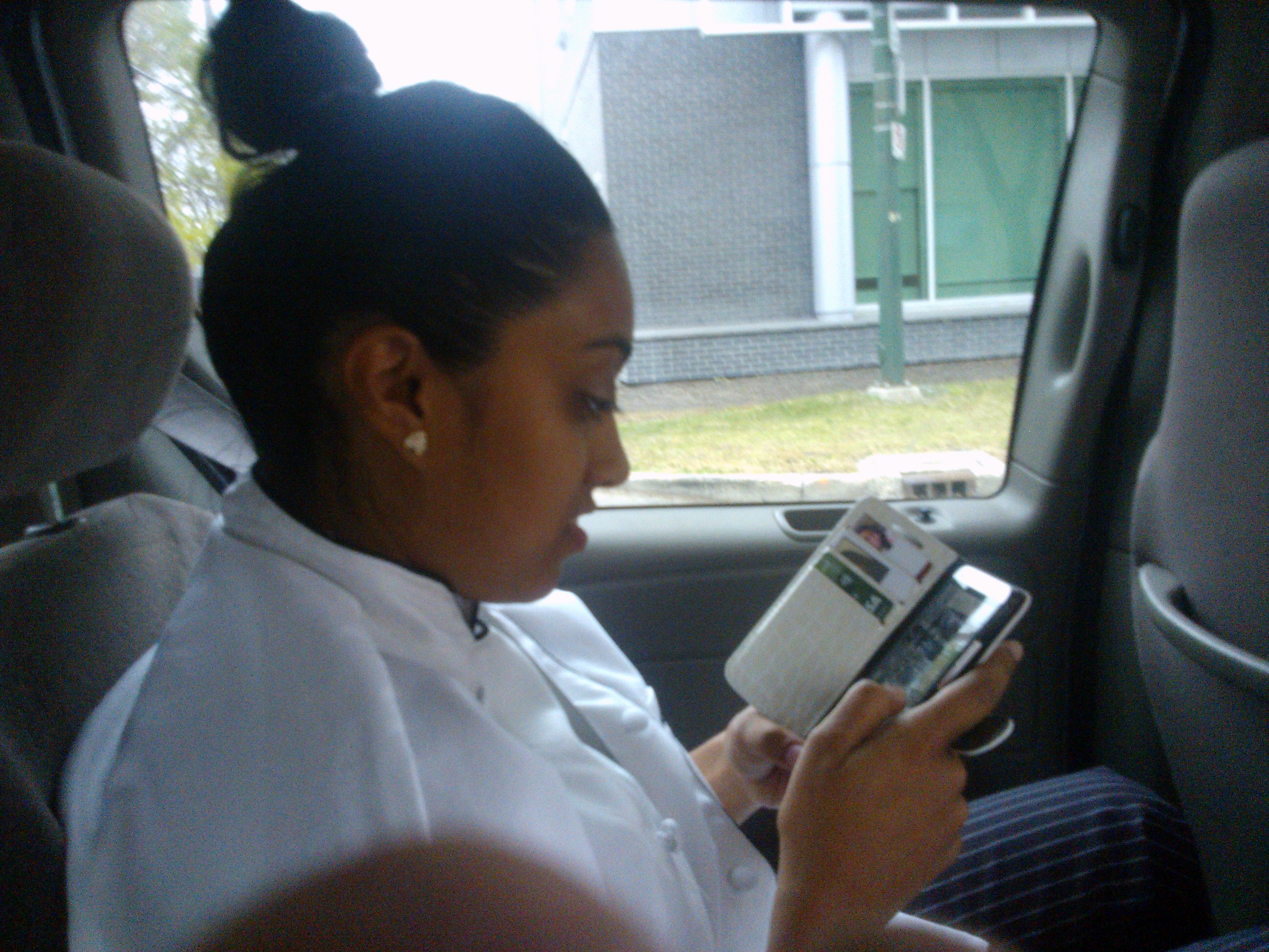 Nandini Looking At Pictures In Van